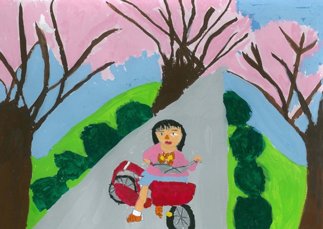 桜の下でサイクリング
